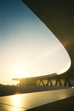 Fototapeta Modern architecture at sunset with human shadows on the wall 