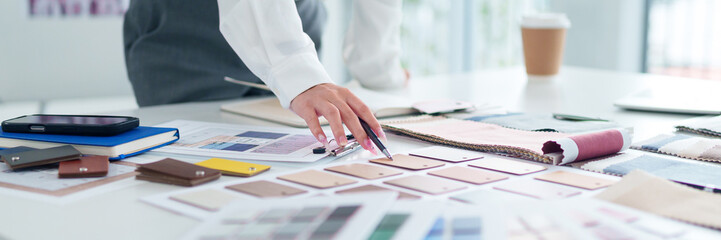 Fototapeta premium Architect Asian Woman Hand Design Material Palette, Floor Plan, Selection Process for Home Interior, Renovation Project and Color Scheme Inspiration