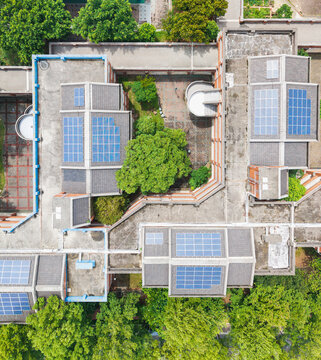 School Aerial View with Solar Panels and Greenery