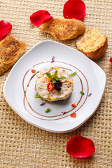 Two-flavored tuna on a white porcelain plate