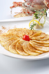Grilled potato chips on a white porcelain plate
