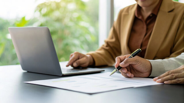Sustainable business green environmental. Business meeting laptop document pen teamwork office planning analysis . Environment, earth day, corporate, development, eco friendly, save energy