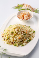 French-style iron plate fried rice with assorted vegetables served in exquisite tableware