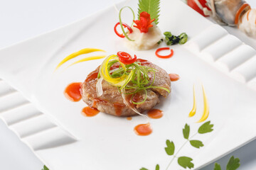 French-style wild boar steak with sauce served on a beautiful plate