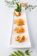 Golden fried chicken steak served in exquisite tableware