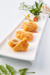 Golden fried chicken steak served in exquisite tableware