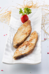 French pan-fried cod fillet in exquisite cutlery