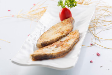 French pan-fried cod fillet in exquisite cutlery
