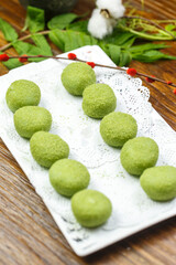 Rectangular porcelain plate with coconut and green mango