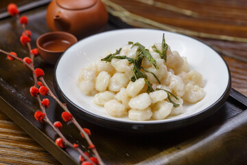 West Lake Longjing shrimps on wooden tray