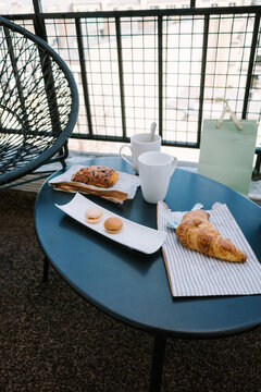  Breakfast pastries on terrace table