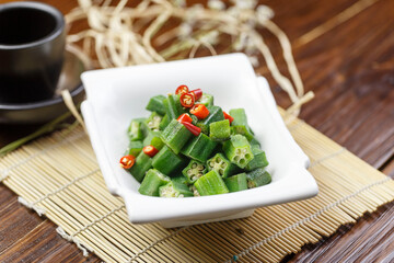 Rectangular white porcelain plate with okra salad