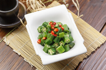 Rectangular white porcelain plate with okra salad