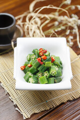 Rectangular white porcelain plate with okra salad