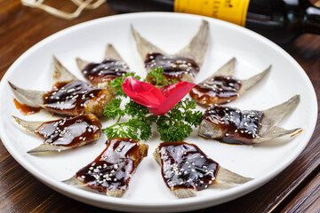 Steamed fish tail with sauce