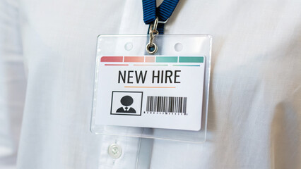 Job labor employment, unemployment. New hire badge employment identification card hanging on shirt, workplace onboarding process . Hiring rate, economic growth, opening workforce market