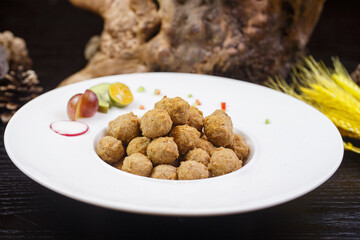 Deep-fried pork meatballs with five spices and sesame seeds