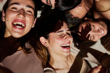 Friends enjoying laughter together in a joyful gathering