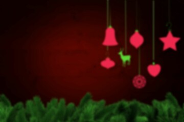 Obraz premium Blurred christmas decorations hanging over wood
