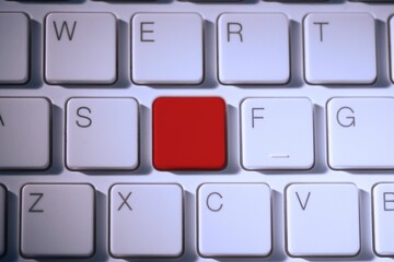 Digital composite of Red key on keyboard