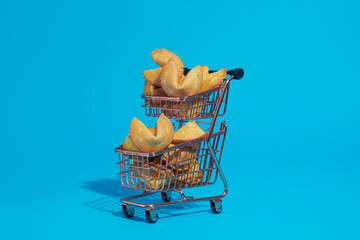 fortune cookies on a small shopping cart