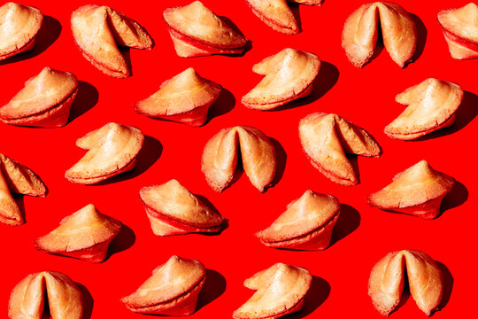 some fortune cookies on a red background