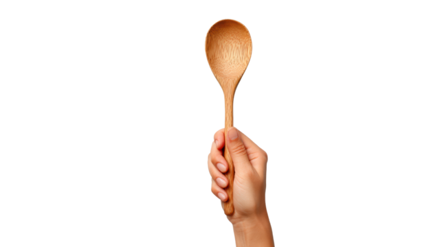Hand holding a wooden spoon, isolated on white background.