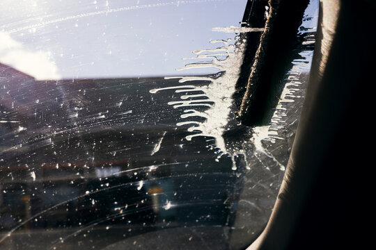 Splat of Squeegee to Clean Car Windshield