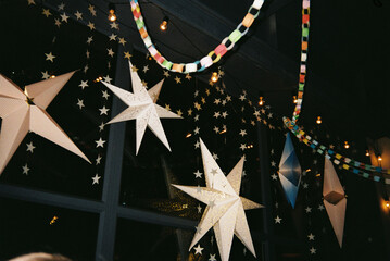 Festive decorations with stars and paper lanterns