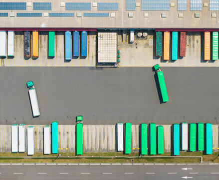 Logistics Warehouse with Colorful Cargo Containers