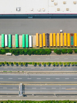 Aerial View of Shipping Containers and Logistics Hub