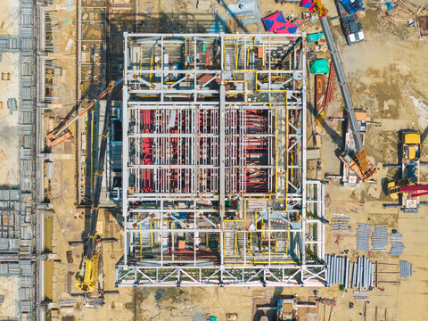 Aerial View of Factory Construction Site with Steel Framework an