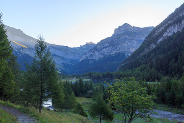 Mountain panorama with summit Mont Gond and lake Lac de Derborence in the morning of Swiss Alps, Switzerland