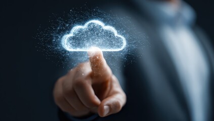 Person touches cloud on screen. Light particles, dark background. Tech use