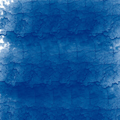 Blue grunge wall with an old, textured, dark, and damaged surface