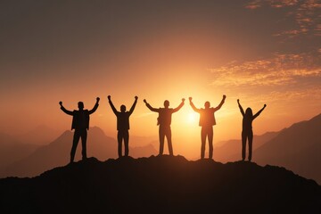 Silhouette of people celebrating on mountaintop