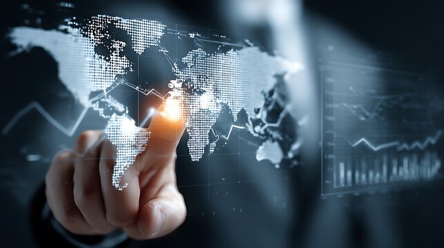 A finger touches a world map with data charts and lines overlaid in a futuristic interface display - Powered by Adobe