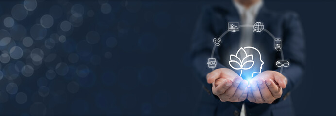 Digital Wellbeing and Detox Concep. Holding a glowing digital interface with icons representing mental wellness on blue background. Balance between staying connected and practicing digital detox.