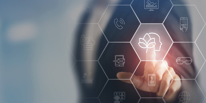 Digital wellbeing in workplace concept. Touching virtual screen with icons representing digital wellbeing, healthy work-life balance. Promoting a healthy relationship with technology.