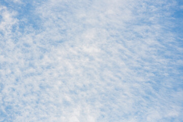 Altocumulus clouds in the blue sky at sunny day ,Blue Sky Background with White Clouds,vast blue sky,little puffy clouds.