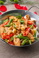 Stainless steel pot with green pepper and garlic pork intestines
