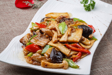 Black casserole with tin foil casserole stewed pig tail