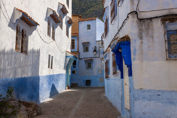 Empty Street in Chefchaouen Morocco Featuring Clay Awnings
