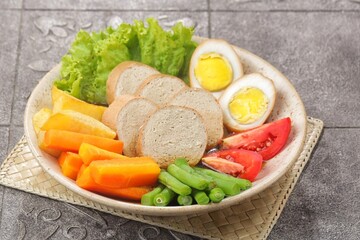 Selat Galantin is known for its combination of savory, sweet, and fresh flavors from its distinctive sauce, served with chicken or beef galantin.