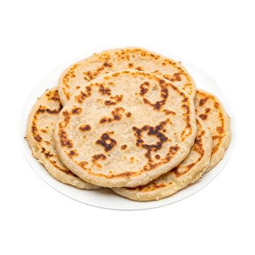 A Serving of Sri Lankan Pol Roti Coconut Flatbreads with Sweet Onion Relish on isolated transparent background