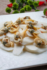 Steamed mussels with long yam in white square porcelain plate