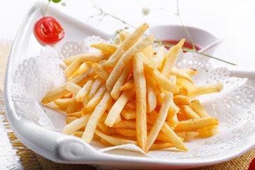 French fries on white porcelain plate