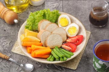 Selat Galantin is known for its combination of savory, sweet, and fresh flavors from its distinctive sauce, served with chicken or beef galantin.