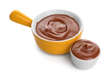 Different bowls of tasty melted chocolate on white background