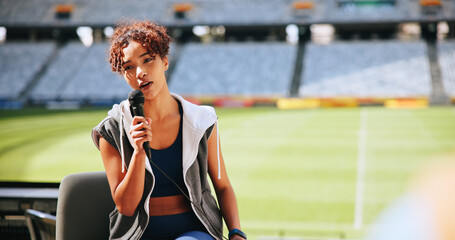 Athlete, mic and talking in interview at stadium for sports broadcast, media question and space....